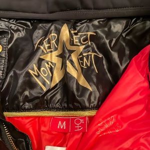 Perfect moment ski pants. Black with faux leather trim. Very good condition